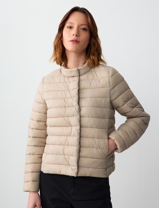 beige inflatable coat combo