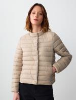 beige inflatable coat combo