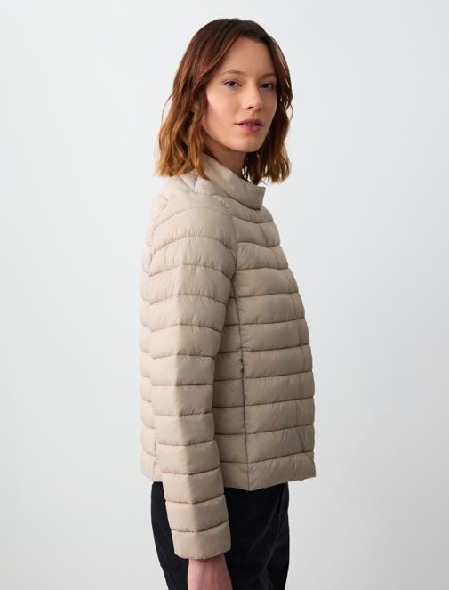 beige inflatable coat combo