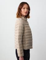 beige inflatable coat combo