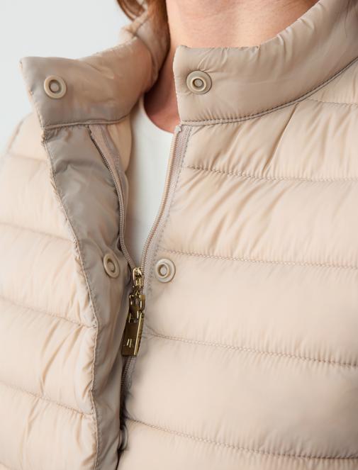 beige inflatable coat combo