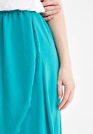 Women Green Asymmetric Skirt