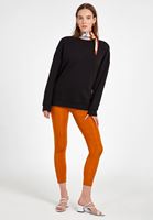 Women Orange High Rise Shiny Leggings