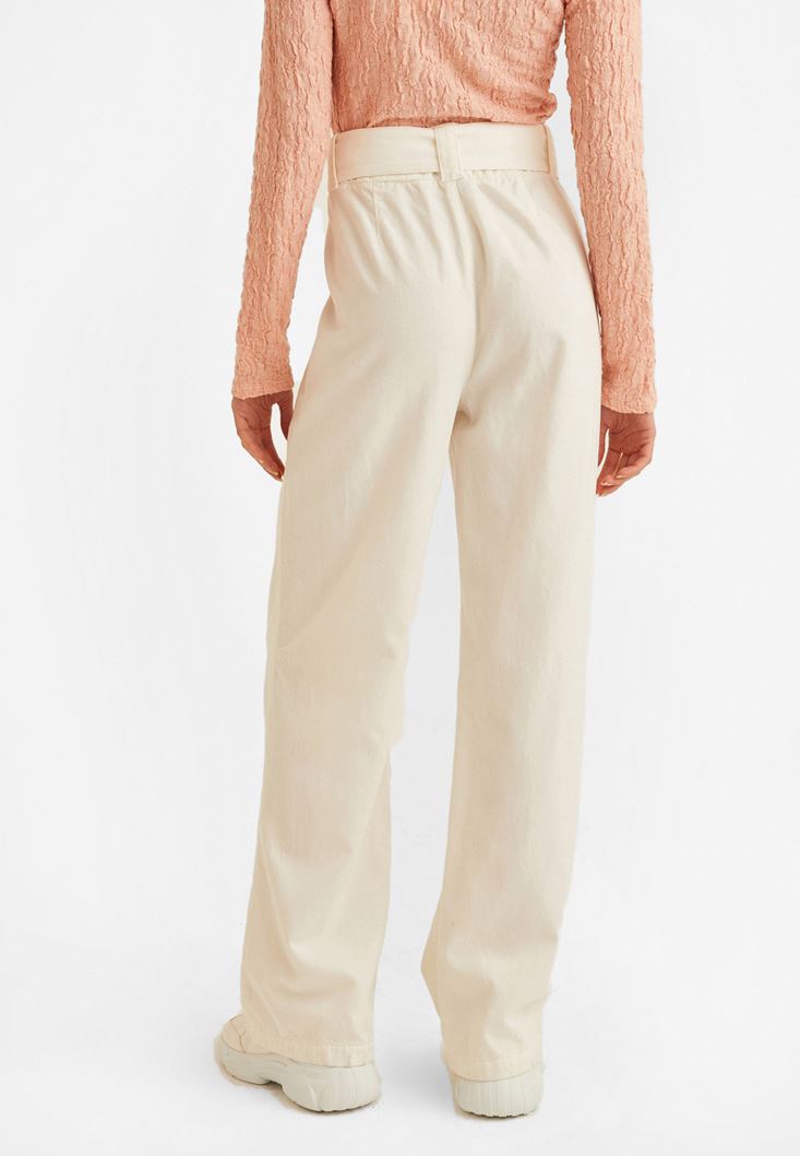 cream colored wide leg pants