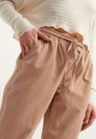 Women Cream Soft Textured Baggy Trousers