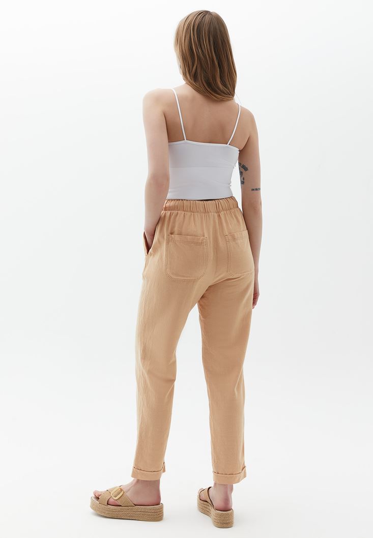Women Beige Carrot Fit Pants with Drawstring
