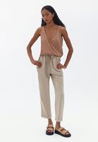 Women Beige High Rise Carrot Fit Pants