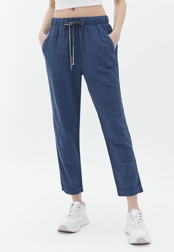 Women Blue High Rise Carrot Fit Pants