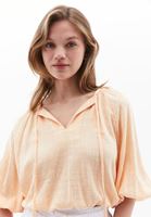 Women Orange Crop Blouse with Elastic Waistband